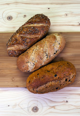 Homemade loaves - Mediterranean bread, honey & sunflower bread, & olive bread.