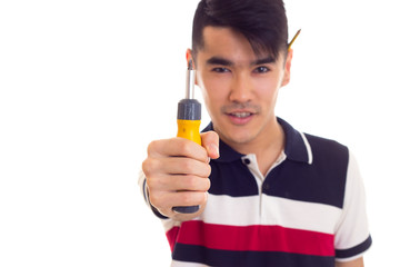 Young man holding a screwdriver