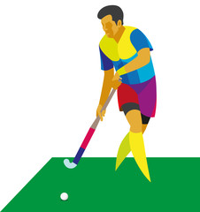 Obraz premium a young man is a player in field hockey takes the ball