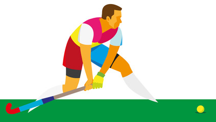 young man player in field hockey is preparing to hit the ball