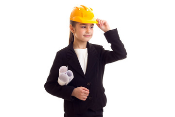 Little girl in yellow protective helmet