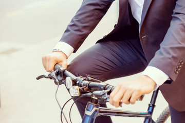 Successful businessman with bicycle