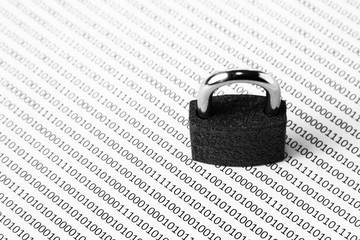 a black and white concept image that can be used to represent cyber security or the protection of...