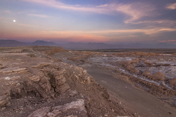 salty Moon valley in atacama desert in Chile at sunset