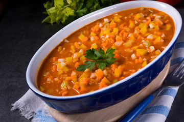 fish with vegetables in tomato sauce