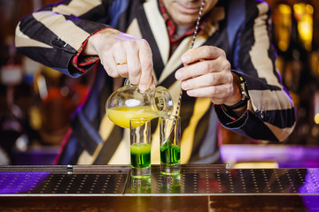 preparing green mexican cocktail