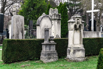 Old Vienna Austrian cemetery architecture with statues and marble tombstones for the graves