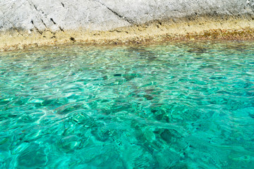 Beautiful clear water and rocks background of Zakinthos island, Greece