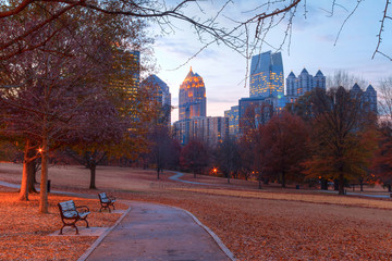 View of the Oak Hill in the Piedmont Park and Midtown Atlanta behind it in autumn twilight, USA