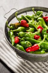 Red and Green Hatch New Mexican Chile Peppers in Colander