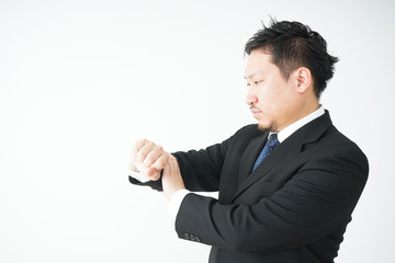 Businessman checking time