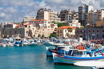 Fototapeta na wymiar Heraklion old town port with colorful boats, at sunny day, Crete island, Greece