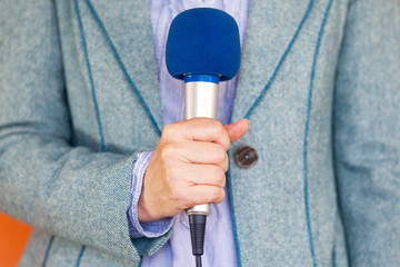 Fototapeta premium News reporting. Journalist. Microphone.
