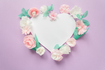 Obraz na płótnie Canvas heart frame with color paper flower