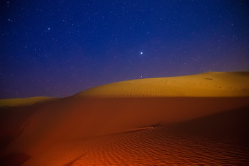 Barkhan dune, starry sky in the desert of Kazakhstan - obrazy, fototapety, plakaty