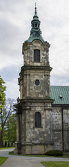 Fototapeta na wymiar Historic bell tower of the church, Cistercian monastery, Jędrzejów Poland