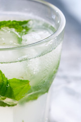 Cold refreshing non-alcoholic cocktail mojito in glass glasses, selective focus, close-up