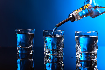  vodka in bar on a blue background