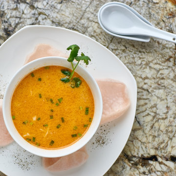 Creamy Crab Soup Served With Crab Chips And Glass Of White Wine On Marble Backround. Top View Or Flat Lay.