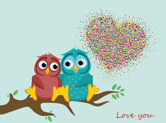 pair of owls in love. Vector. Colorful confetti in the form of hearts