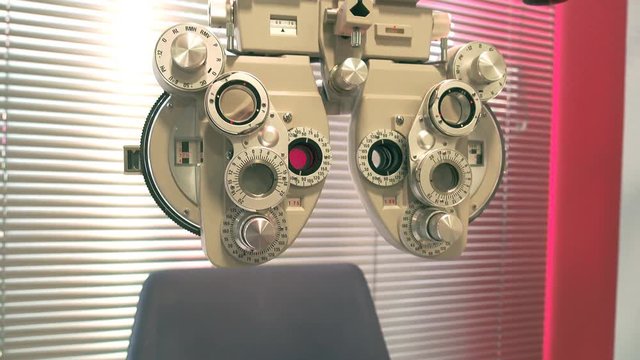 Chair and phoropter gradation machine, sliding camera