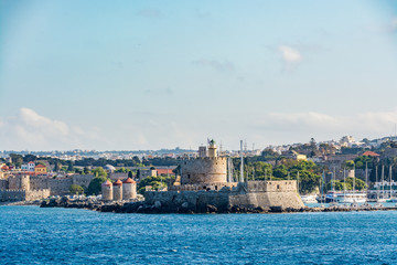 Obraz premium Agios Nikolaos Fortress (Fort of Saint Nicholas) and mills at Rhodes old town, Rhodes island, Greece