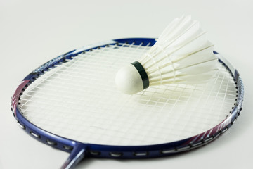 racket and shuttlecock isolate on white background