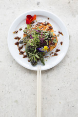 Overhead of Chopsticks on Plate of Vegetable Salad Meal