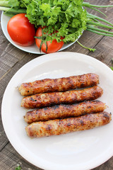 Grilled sausages on the coals