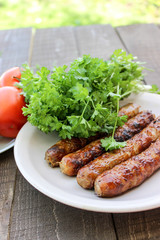 Grilled sausages on the coals