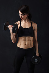 middle-age sportswoman performing sport exercises