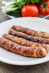 Grilled sausages on the coals