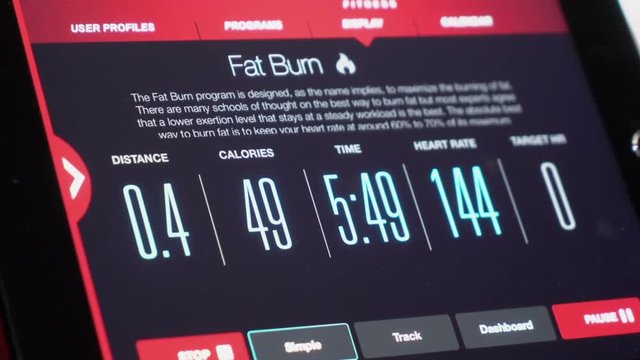 Fitness App connects to elliptical machine displaying workout data on screen