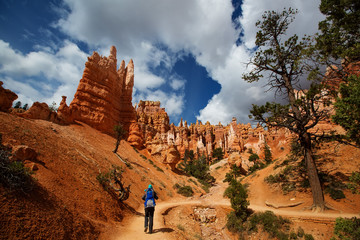 A man with his baby boy are hiking in Bryce canyon National Park, Utah, USA