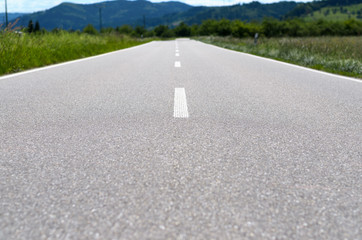 Long country road with white lines