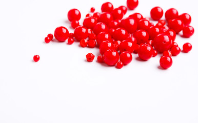 Red beads on white background free space