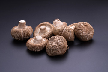 Shiitake mushrooms on a black table