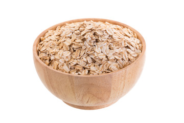 Oat flakes in a wooden bowl on a white background.