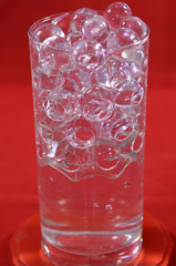 Silicone balls on a red background