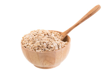 Oat flakes in a wooden bowl on a white background.