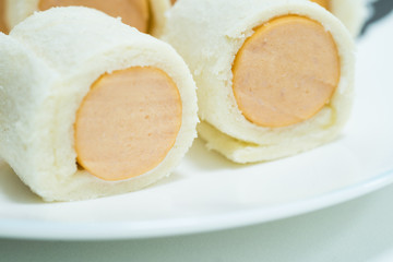 Fototapeta na wymiar bread with sausage roll.selective focus