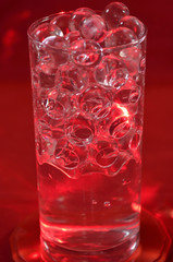 Silicone balls on a red background