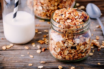 Healthy breakfast homemade granola in glass jar