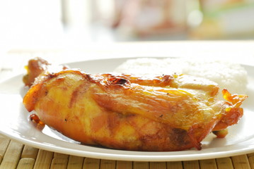 grilled chicken leg eat with sticky rice on dish