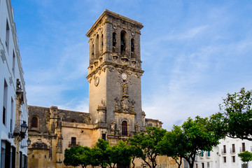 Fototapeta na wymiar Church of Santa María de la Asunción, Arcos de la Frontera, Cádiz, Spain. Traveling through the Sierra de Grazalema.