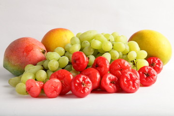 Organic fruits-Rose apple.grapes and mangoes