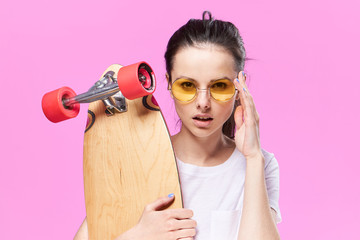 woman with glasses, skateboard