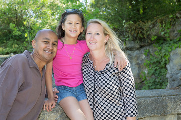 couple mixed with a blonde woman and a man of Indian or South American origin