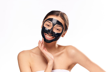 naked woman with a black mask on her face