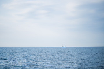 yacht and blue water ocean